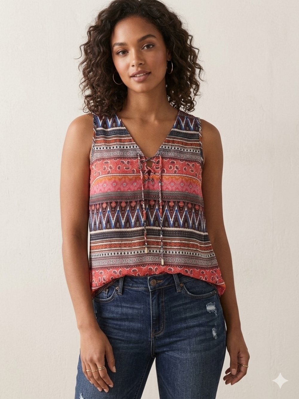 Mileage Boho Geometric Print Sleeveless Lace-Up Tassel V-Neck Blouse